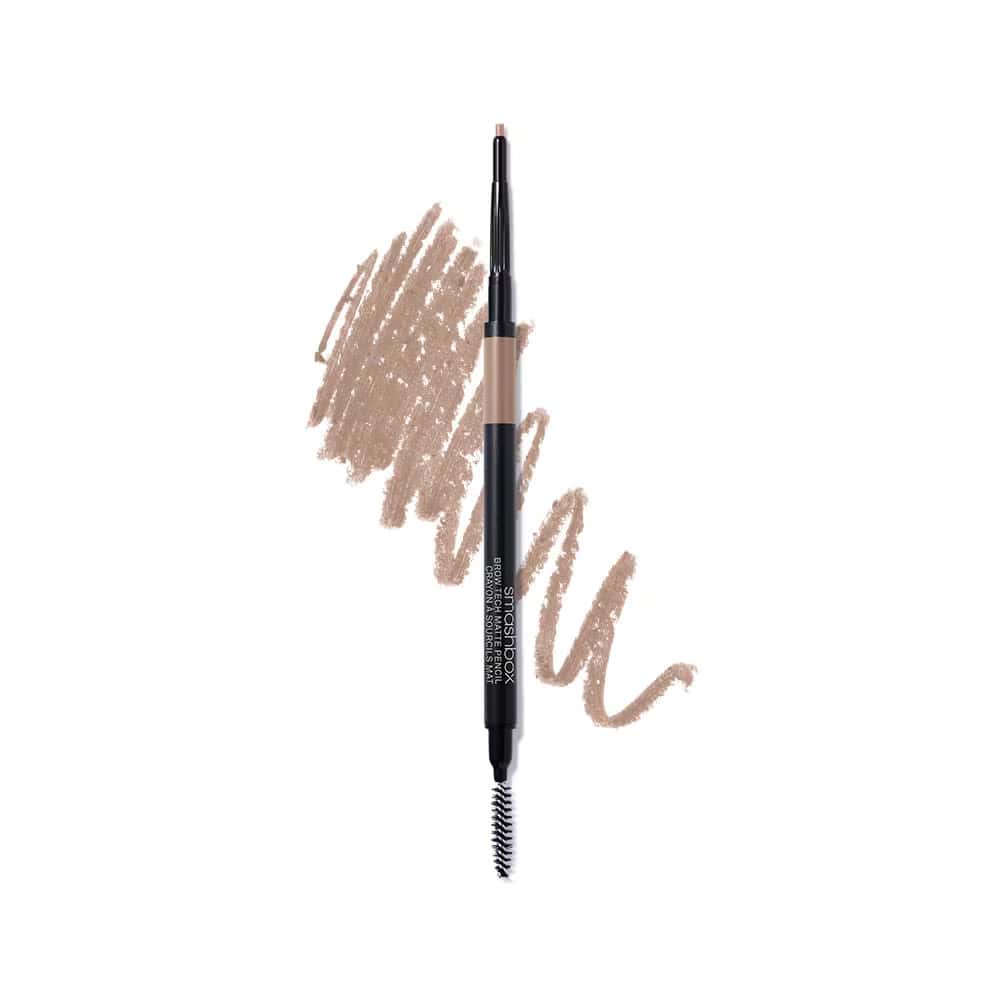 Dual-ended Brow Tech Matte Pencil in earthy brown tone with spoolie brush.