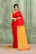 Beautiful Red Embellished Cotton Blend Jamdani Saree featuring traditional weave patterns.