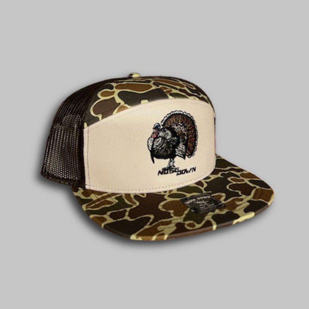 Selection of Spring Turkey hunting hats including trucker, 7-panel, and rope styles.
