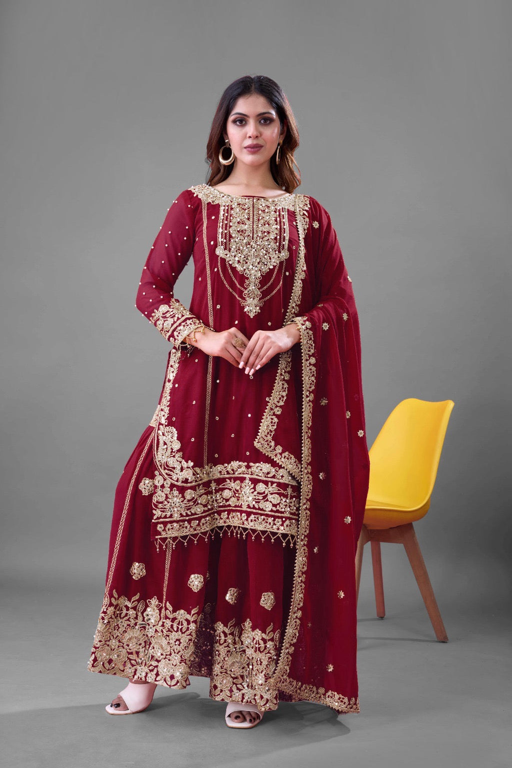 Maroon Faux Georgette Palazzo Suit with heavy embroidery and Moti work