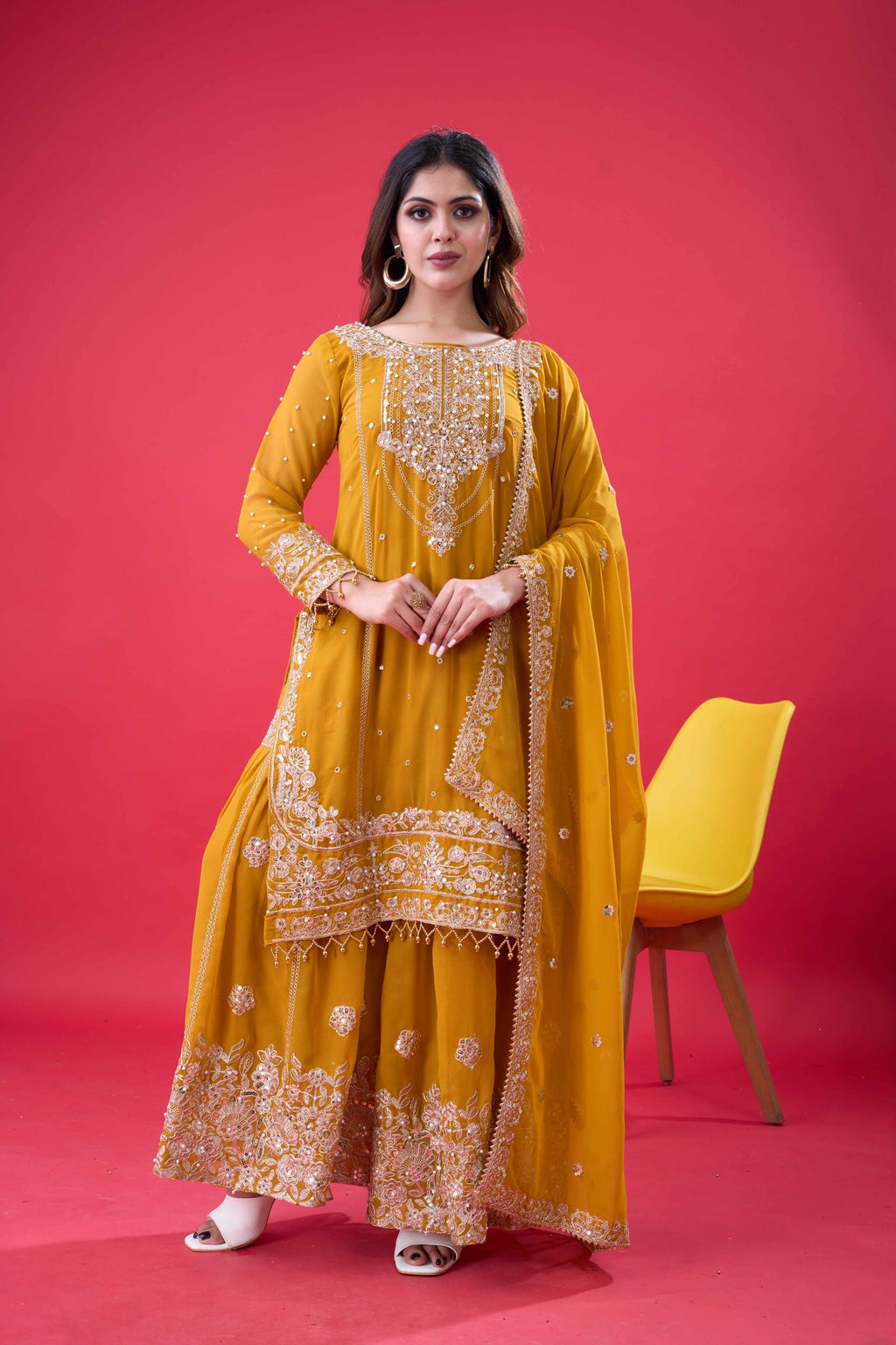 Yellow Faux Georgette palazzo suit with rivet moti and embroidery work