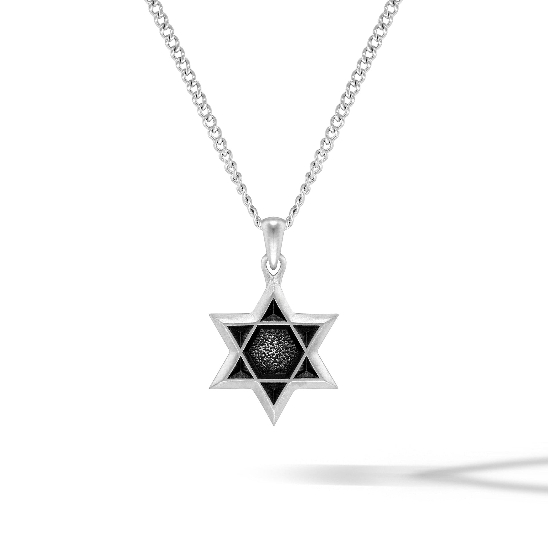 Minimalist Star of David pendant in high-polish 925 sterling silver.