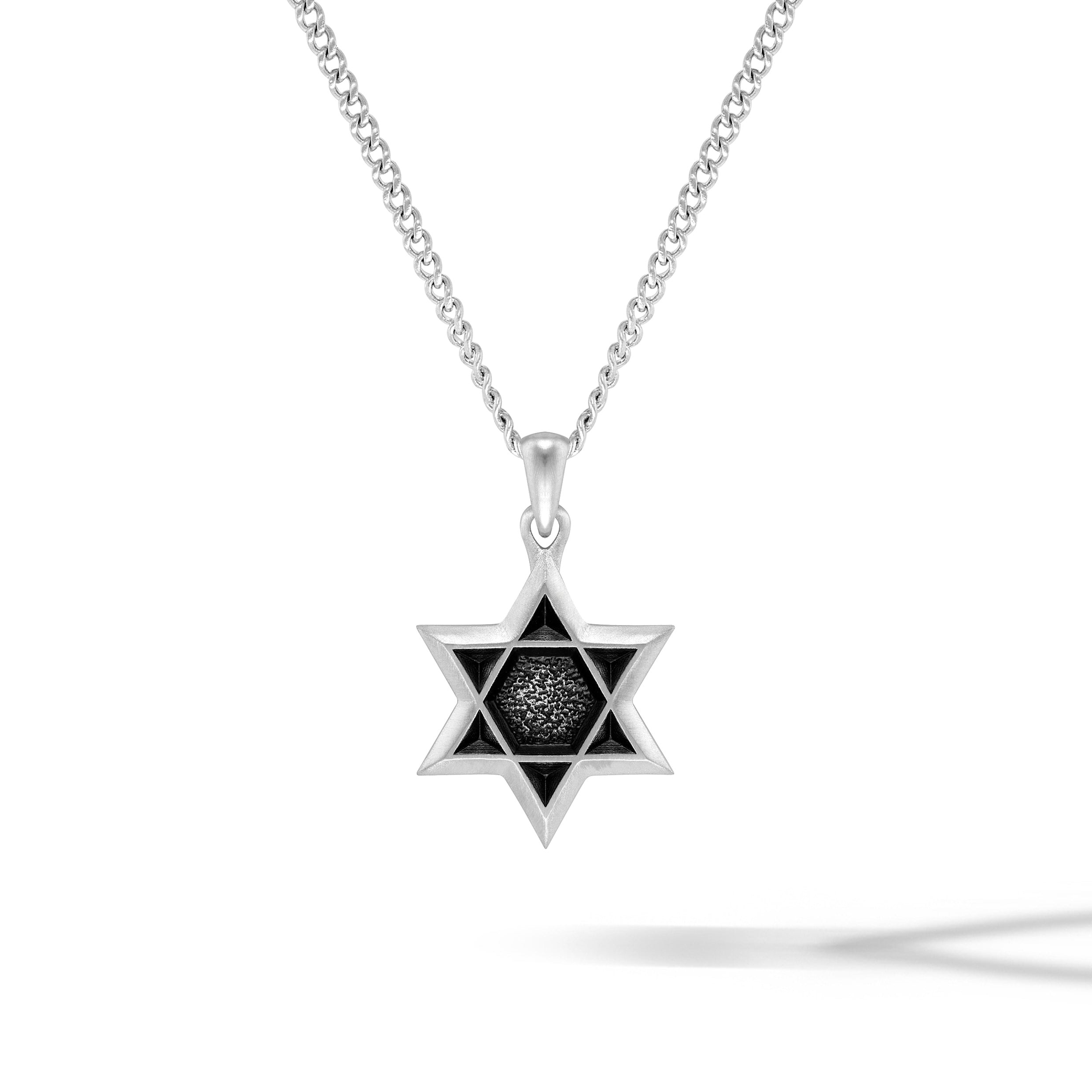 Minimalist Star of David pendant in high-polish 925 sterling silver.
