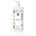 Bottle of Eminence Stone Crop Body Lotion in white and green packaging