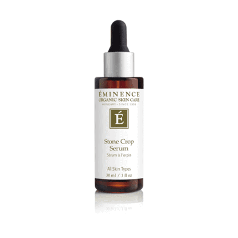 Eminence Stone Crop Serum 30 ml bottle against a minimalist clinical background