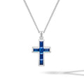 Close up of a minimalist Sapphire Gemstone Cross Pendant crafted in 925 sterling silver
