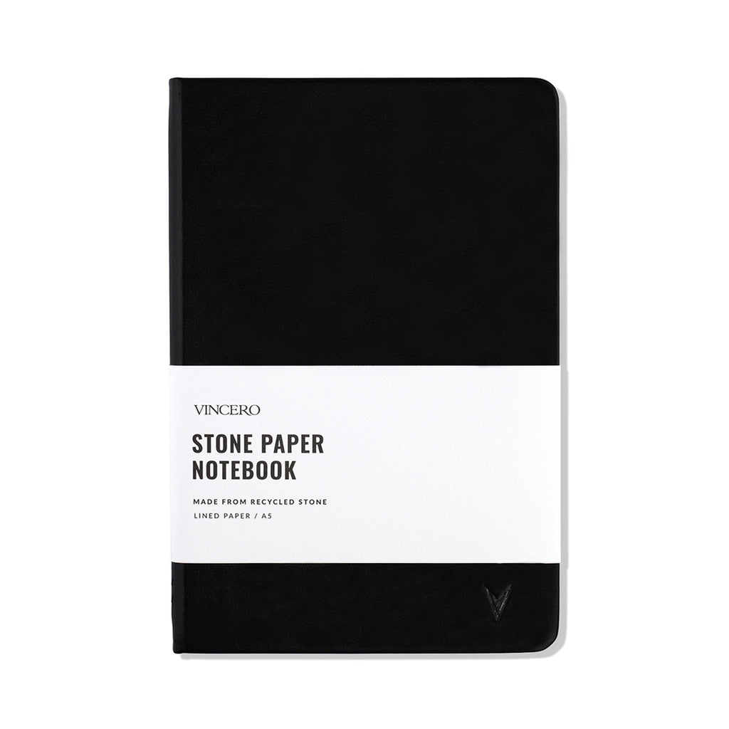 A premium black hardcover notebook with elastic closure and lay-flat binding.