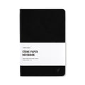 A premium black hardcover notebook with elastic closure and lay-flat binding.