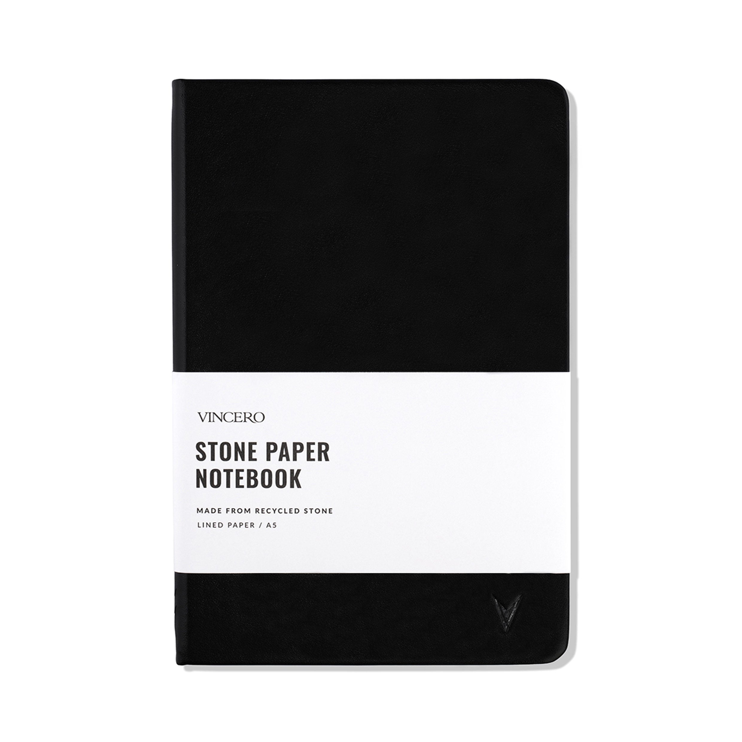 A premium black hardcover notebook with elastic closure and lay-flat binding.
