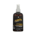 Bottle of Suavecito Whiskey Bar Aftershave 8oz for soothing post-shave skin care.