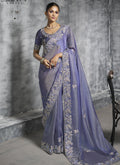 Elegant lavender silk saree with heavy intricate embroidery for wedding wear