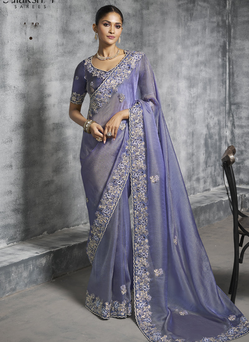 Elegant lavender silk saree with heavy intricate embroidery for wedding wear