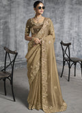 Close-up of a Beige Silk Saree with heavy embroidery detailing, perfect for wedding and party wear.