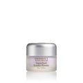 Éminence superfood booster powder in a glass container with a silver lid.