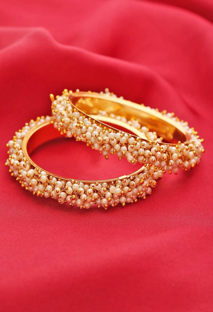 Elegant Pearl and Golden Off-White Bangle Set