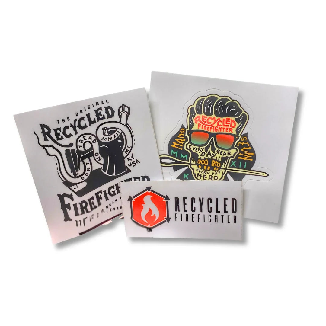 A selection of Recycled Firefighter brand stickers including SKULL, DTOM, and Logo designs.