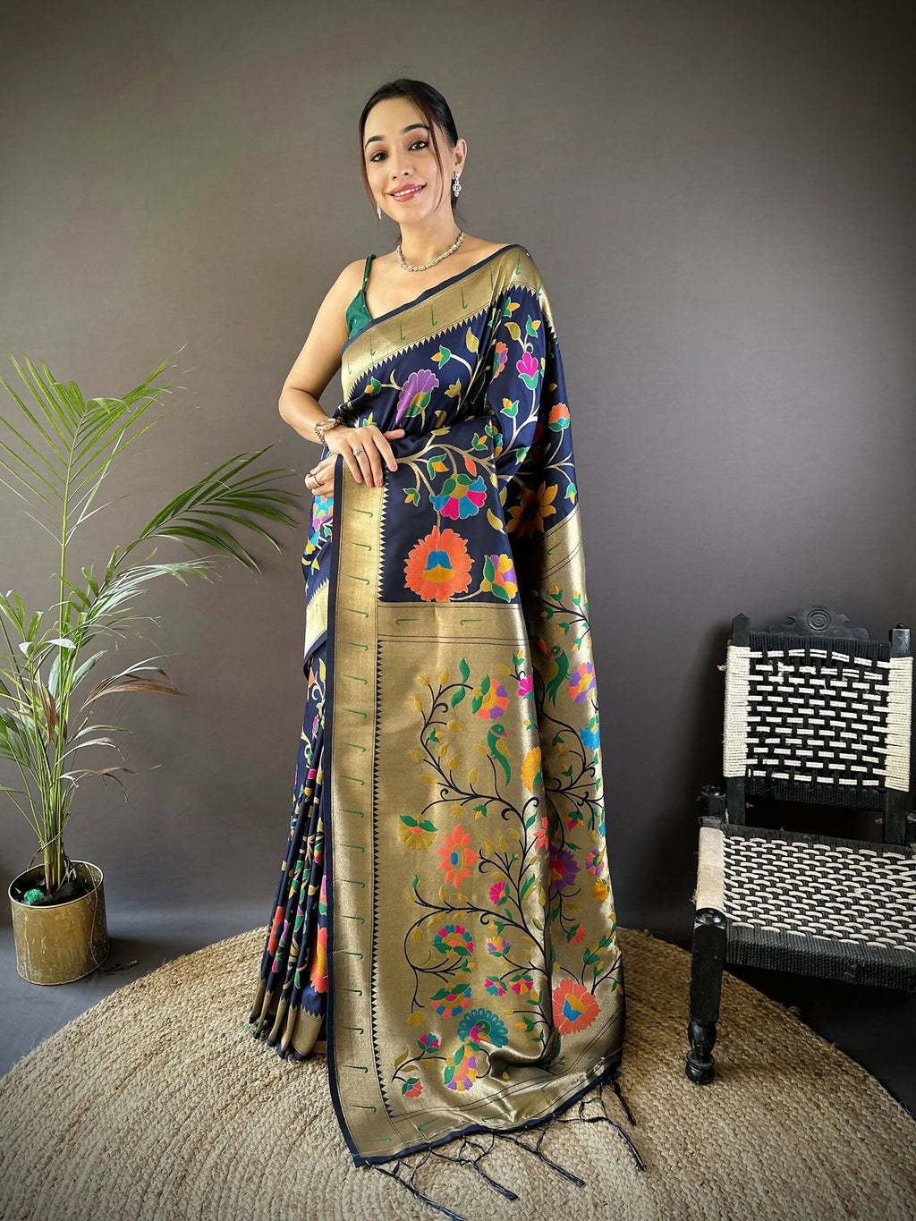 Navy blue soft silk Paithani saree with zari woven floral motifs
