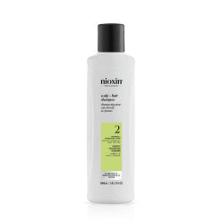 Clinical white and lime green bottle of Nioxin System 2 Shampoo for thinning hair