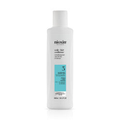 Bottle of Nioxin System 3 Conditioner for light thinning and color-treated hair.