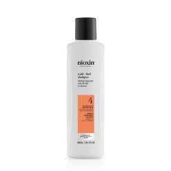 Bottle of Nioxin System 4 Shampoo for thinning, color-treated hair