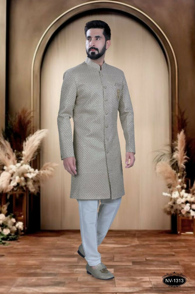 Boys pink silk kurta with all-over sequence embroidery paired with white pyjamas