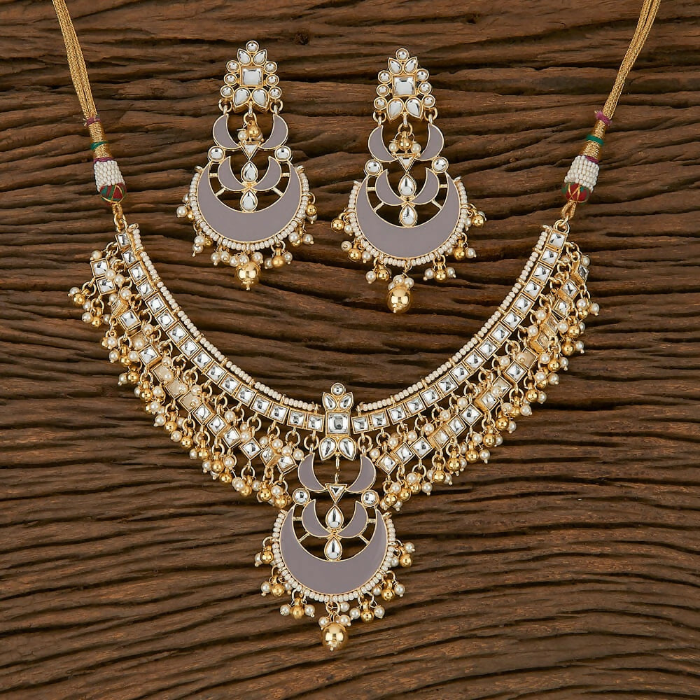 Exquisite golden white and grey Kundan, pearl, and onyx necklace set for women