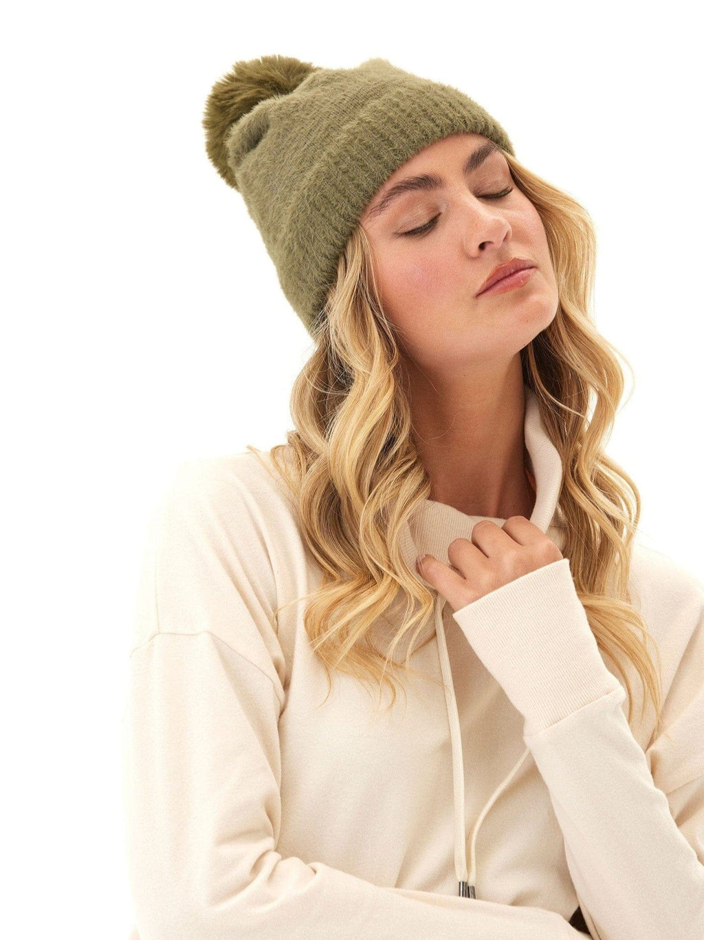 Fuzzy knit beanie with puff top in a soft texture finish