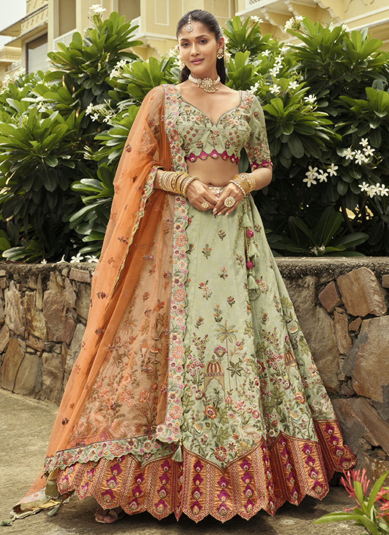 Sea Green silk lehenga choli with heavy embroidery and artisanal mirror work for wedding wear