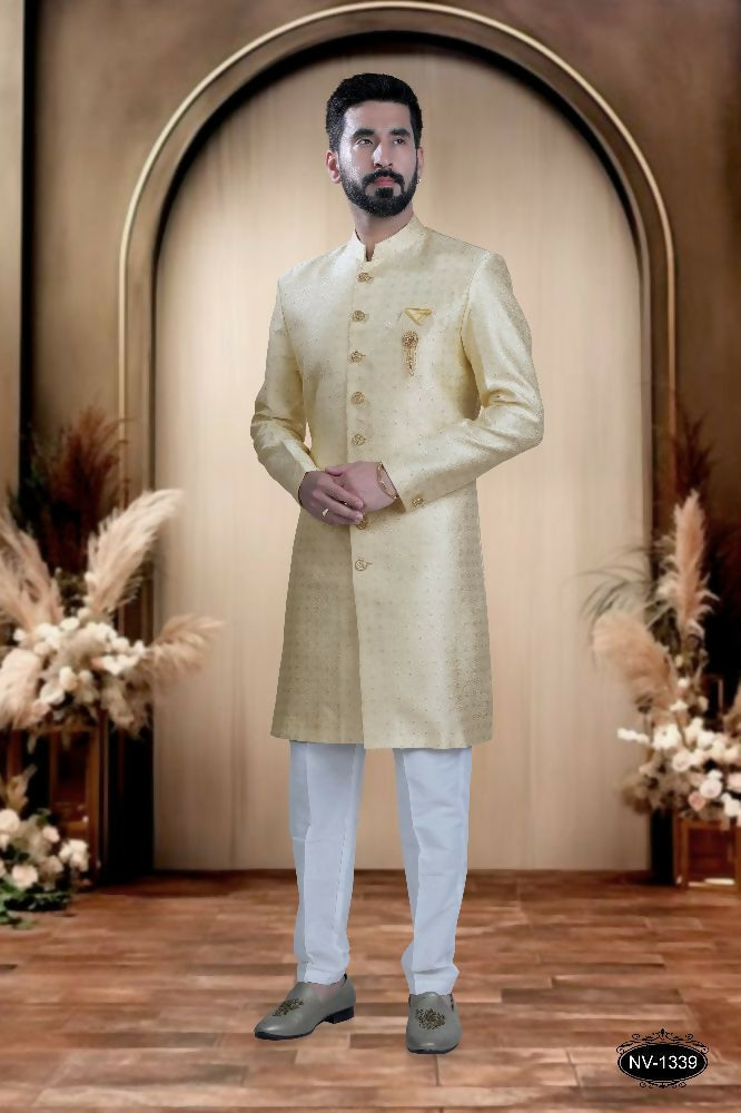 Cream brocade ethnic kurta top with crisp white pyjama pants for boys