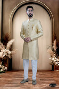 Cream brocade ethnic kurta top with crisp white pyjama pants for boys