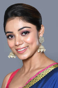 High-quality image of Golden White Kundan and pearl earrings, ideal for festive wear.