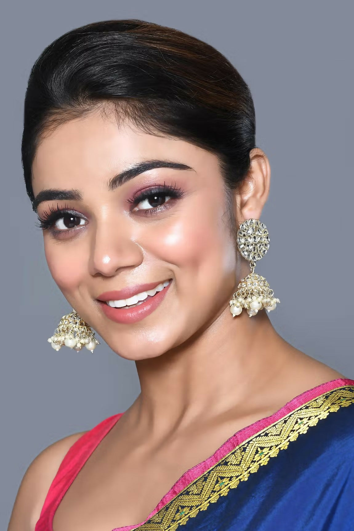 High-quality image of Golden White Kundan and pearl earrings, ideal for festive wear.