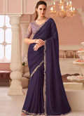 Violet georgette saree with intricate embroidery and matching unstitched blouse piece