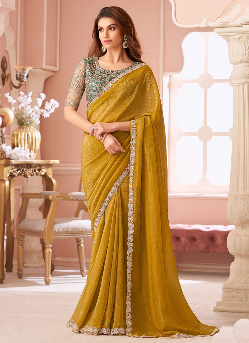 Yellow georgette saree with embroidery for party wear