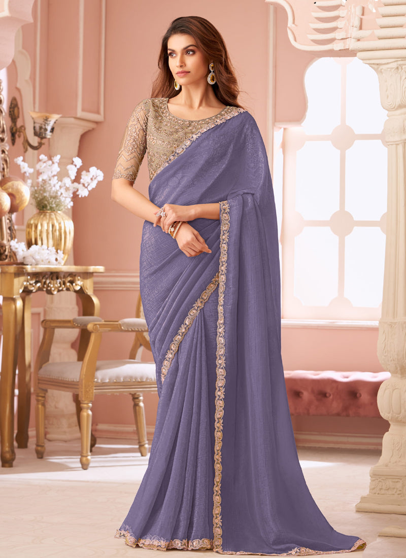 Lavender georgette saree with embroidery detail and unstitched blouse
