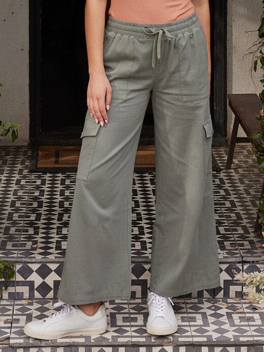 A pair of Eila stretch twill wide leg cargo pants in olive green with a relaxed fit and pull-on closure.