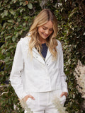 Model wearing a structured stretch twill utility jacket with an integrated hood in a modern slim fit.