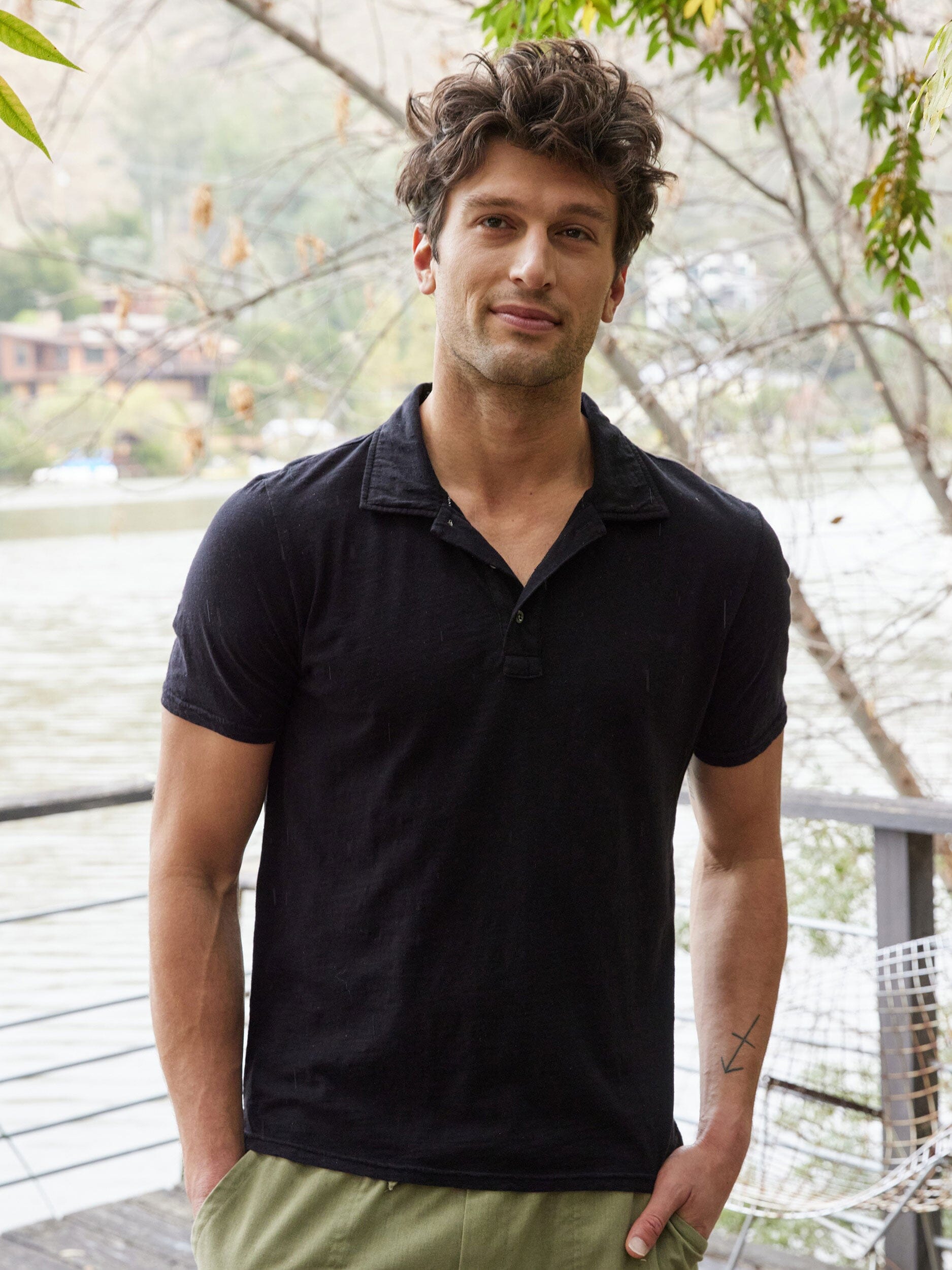Model wearing a perfectly fitted 100% organic cotton slub jersey polo shirt