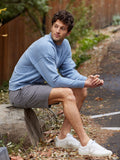 A comfortable Rudy Triblend Fleece Drop Shoulder Sweatshirt in a neutral tone, featuring a soft brushed-back fleece interior.