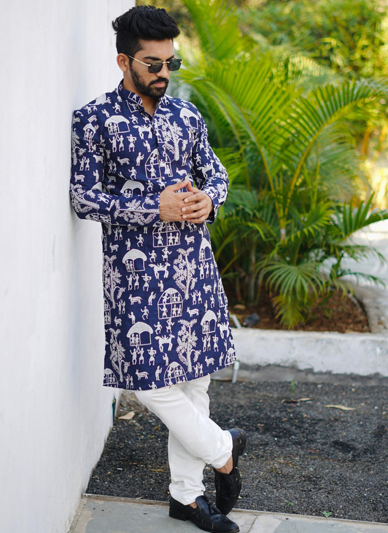 Toddler boy wearing a blue Lucknowi silk kurta and pajama set for a traditional event