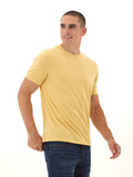 Close up of men's muted golden yellow crew neck t-shirt in a heathered knit fabric.
