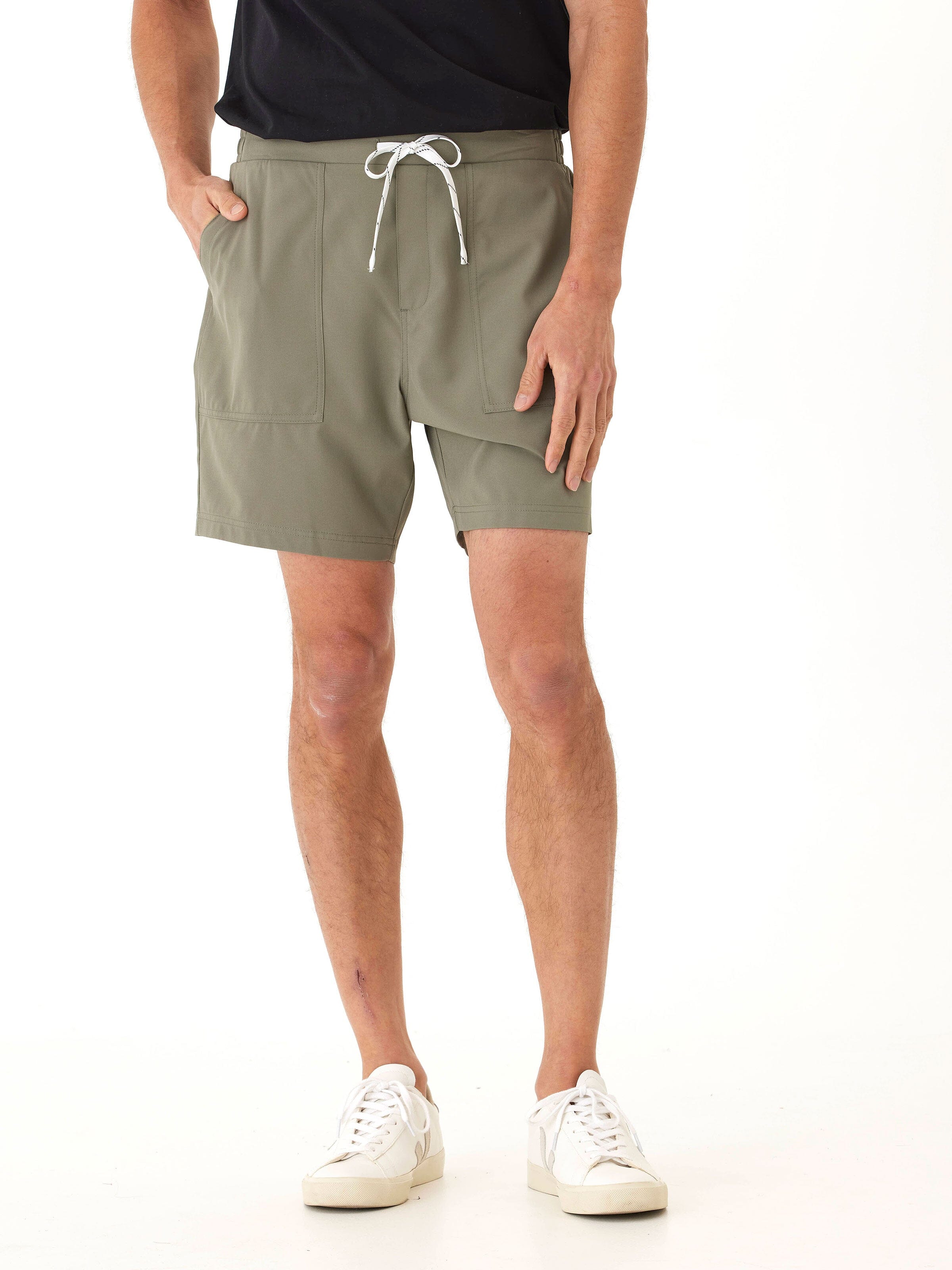 Men's Prescott Essential Eco Woven Short in muted olive green with white drawstring and patch pockets.