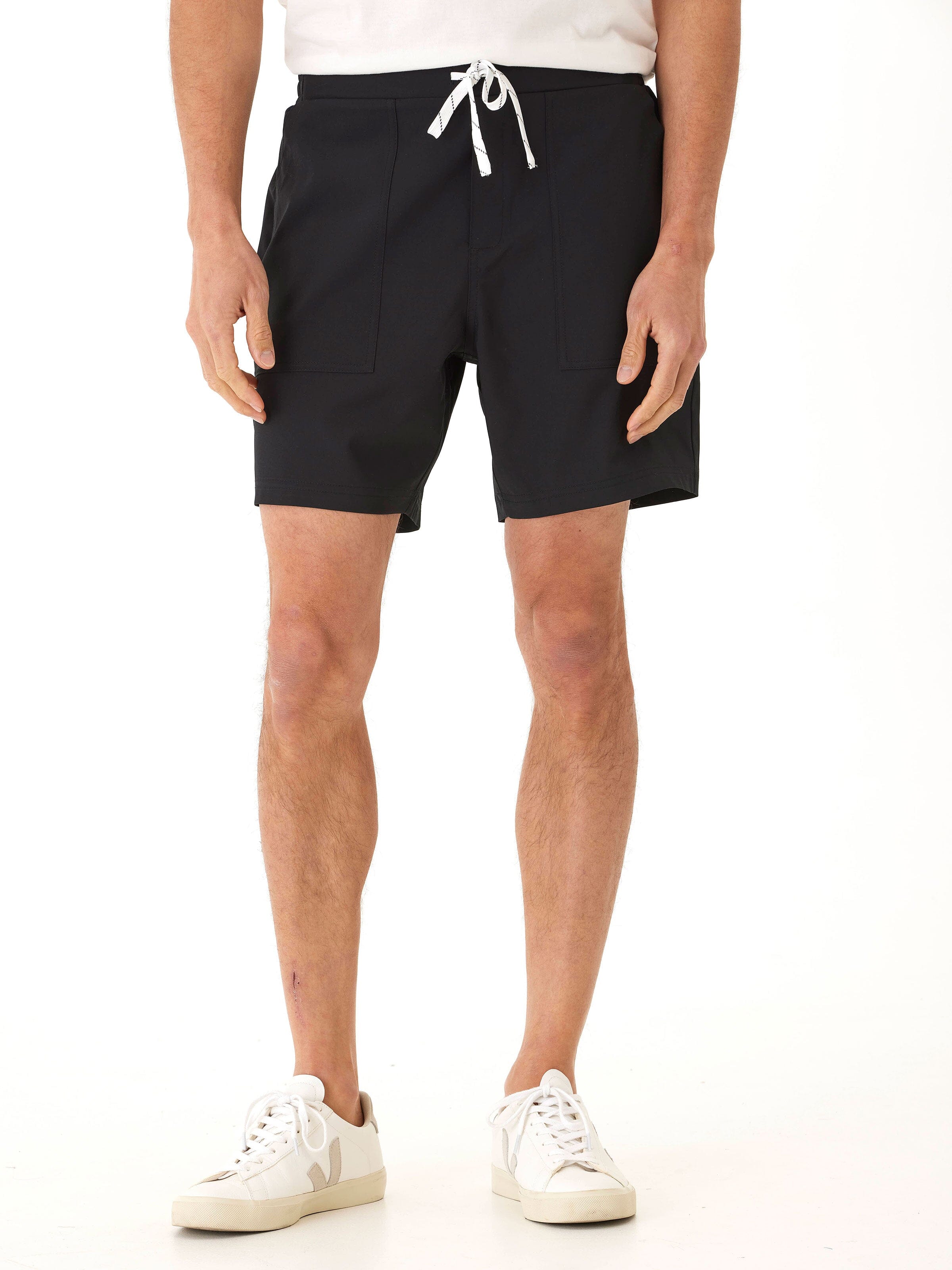 Men's Prescott Essential Eco Woven Short in solid black with a relaxed fit and pull-on waistband.