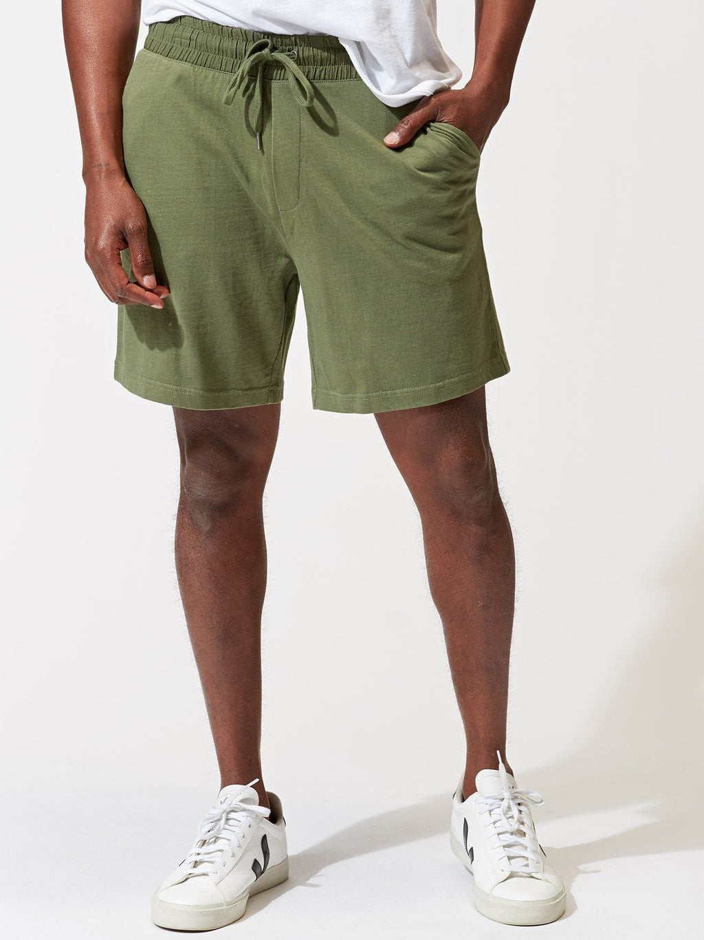 Men wearing Terence 6.5 inch knit athletic shorts in olive green