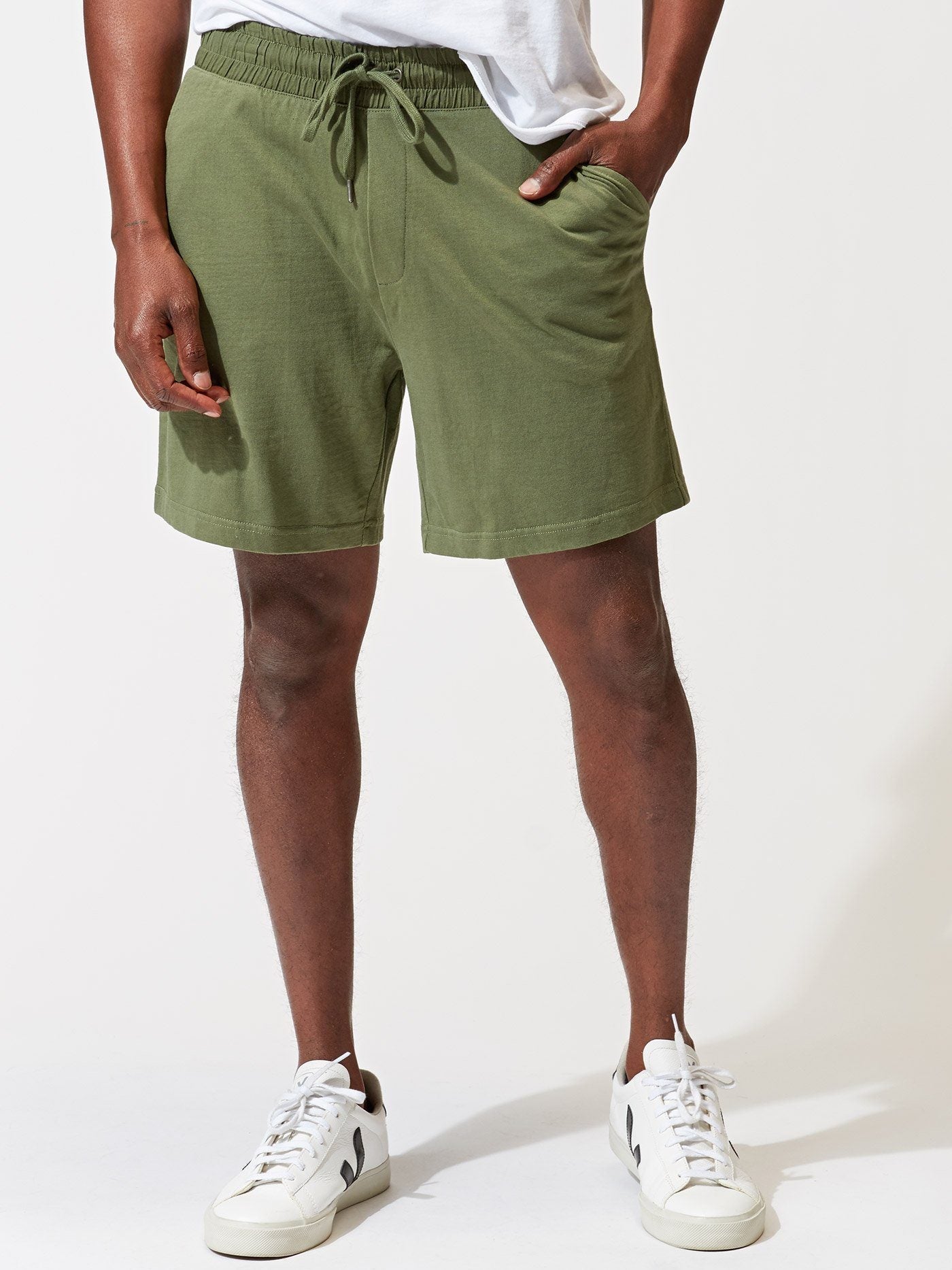 Men wearing Terence 6.5 inch knit athletic shorts in olive green