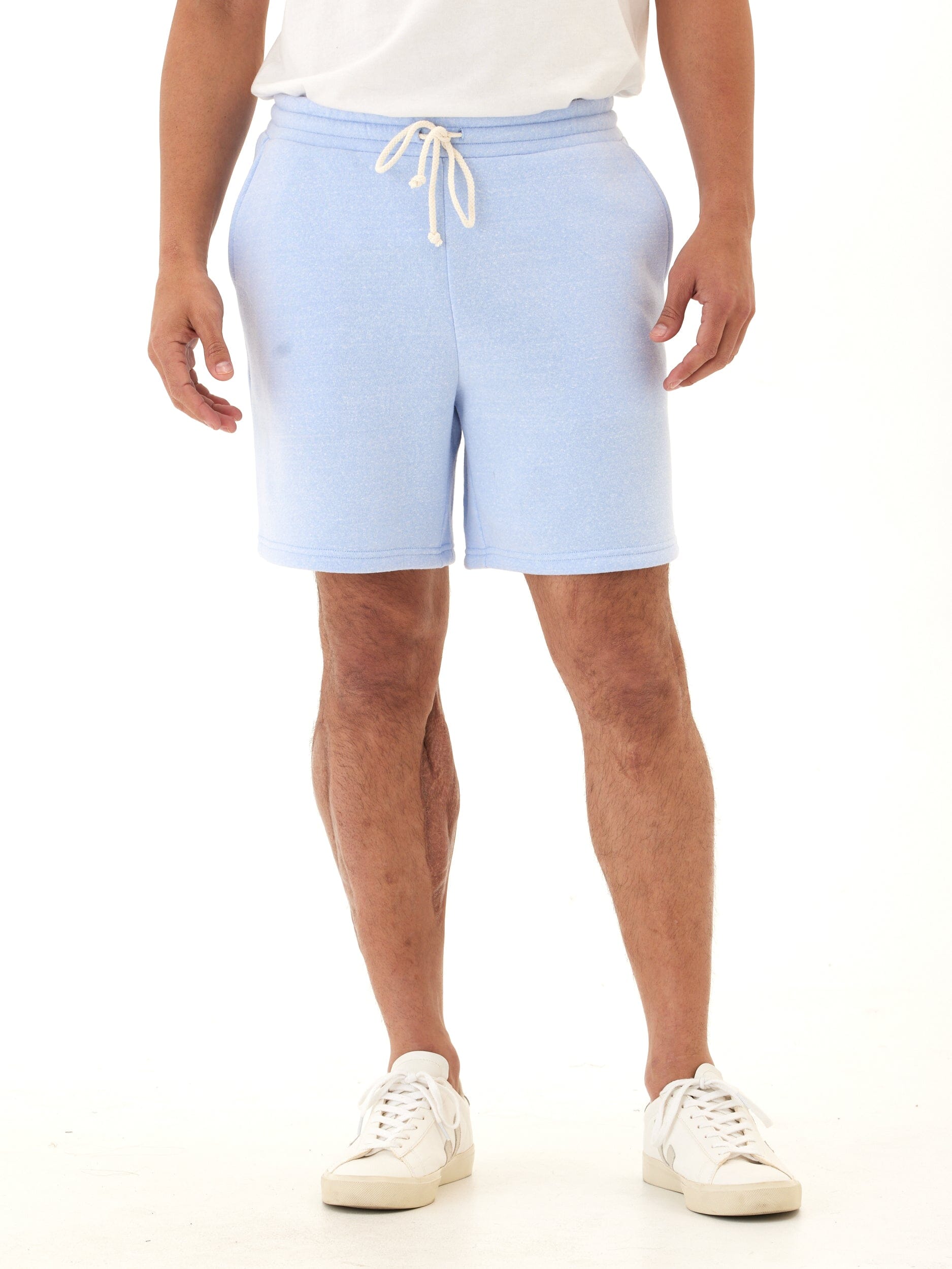 Men's relaxed fit core triblend fleece shorts in soft heathered light blue with drawstring detail
