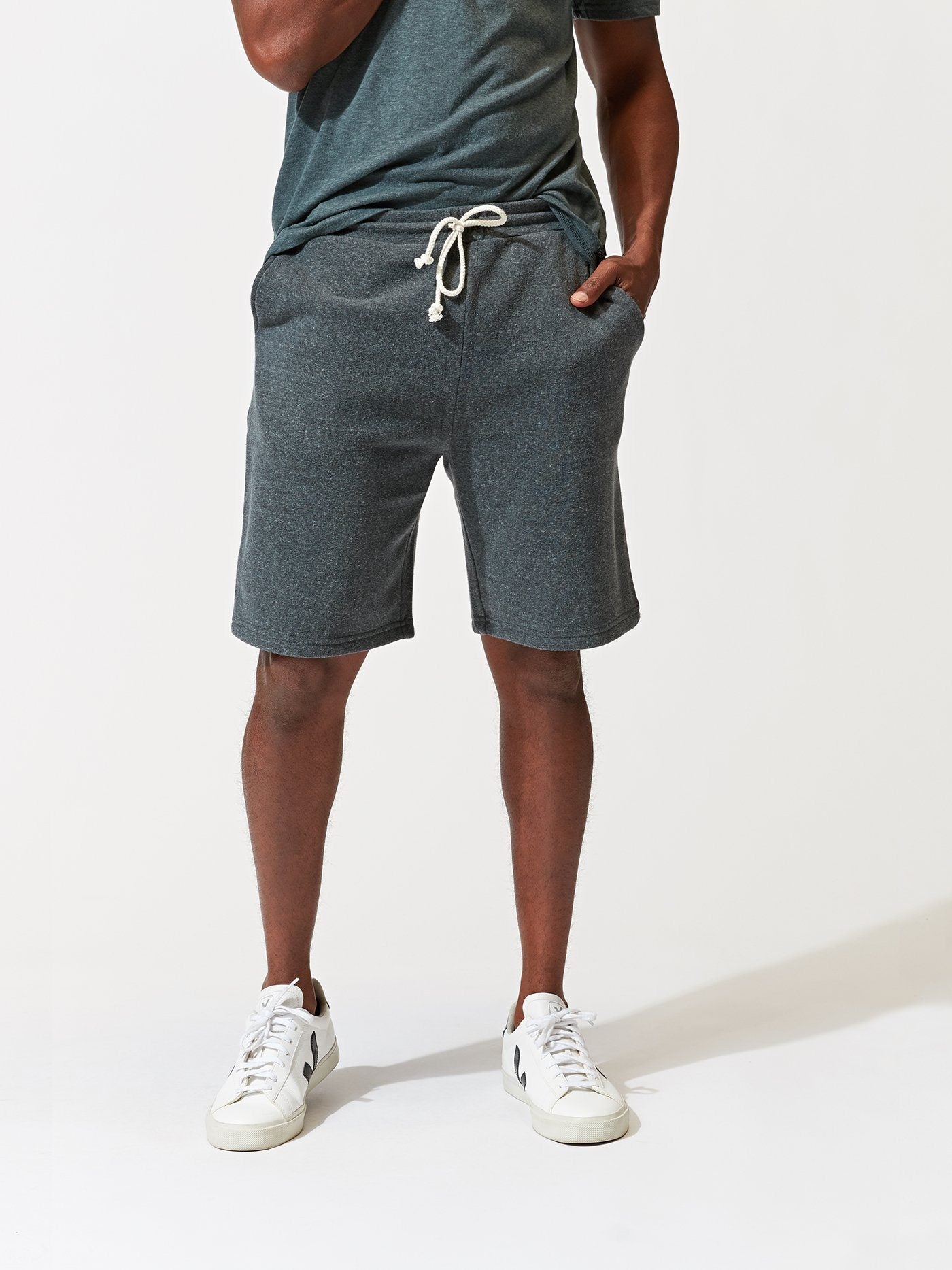 Men wearing charcoal-grey Garrett 9-inch triblend knit shorts for an athletic look