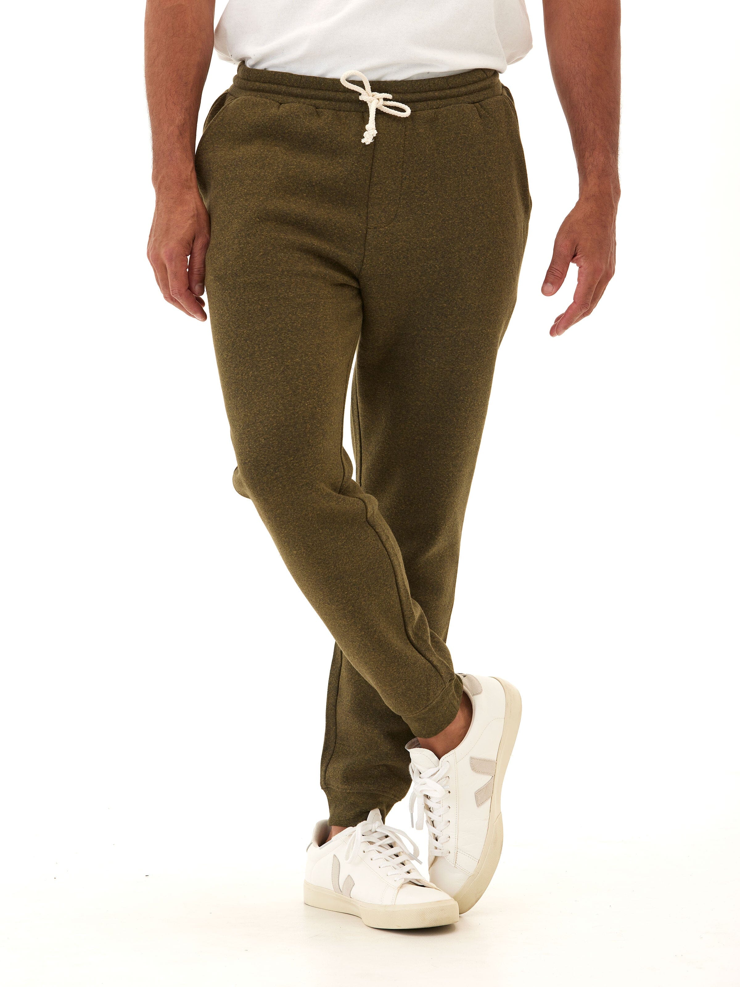 Man wearing comfortable grey triblend fleece joggers with a modern straight leg fit