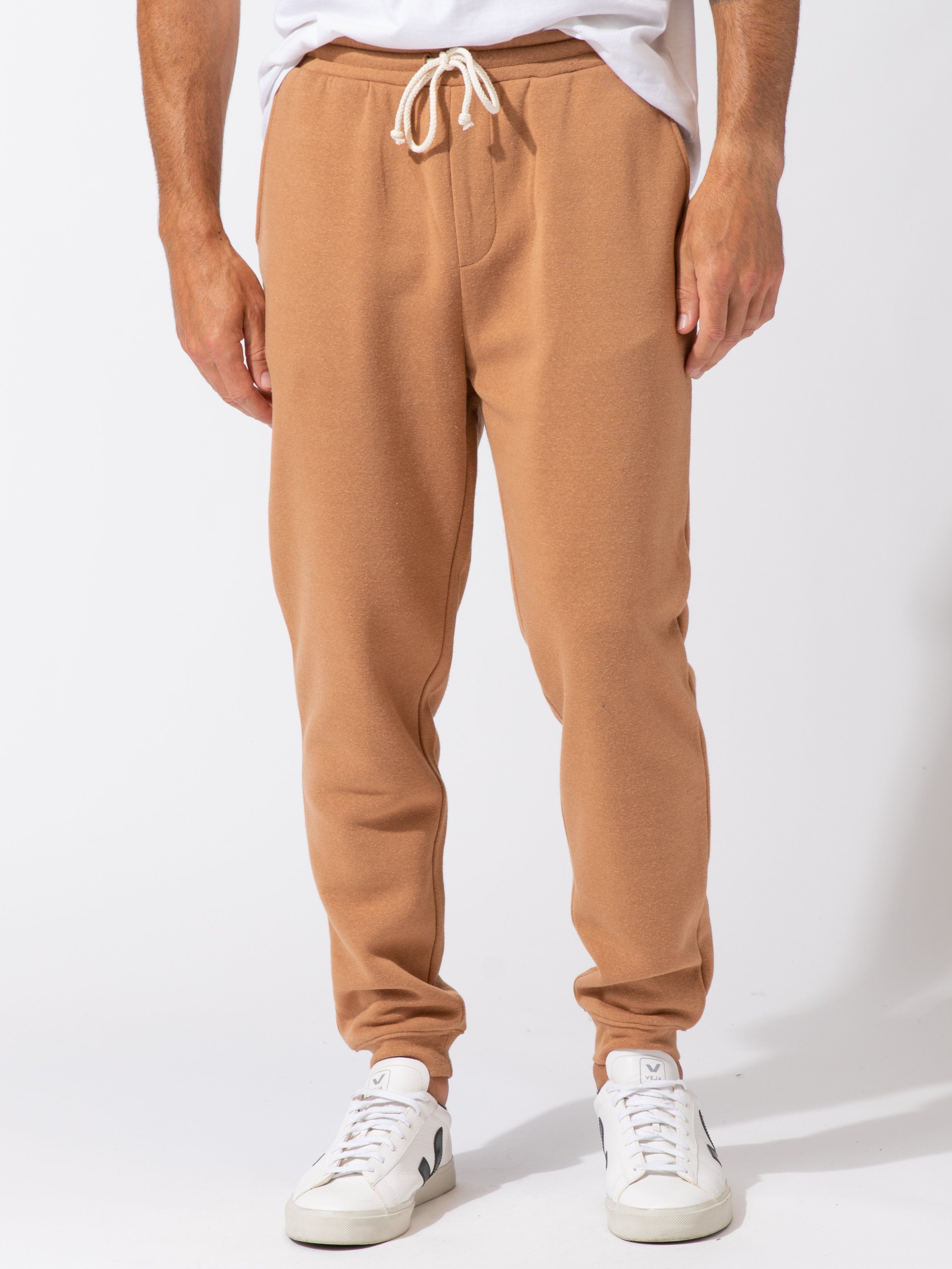 A pair of men's relaxed-fit camel triblend fleece joggers with a tapered leg and pull-on waistband.