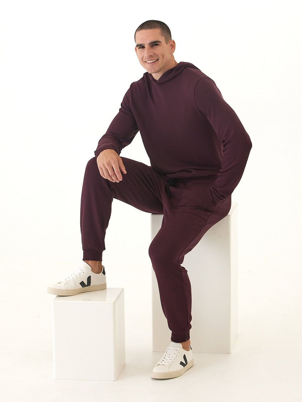 Men's Core Feather Fleece Jogger in deep burgundy wine color with a tapered athletic fit